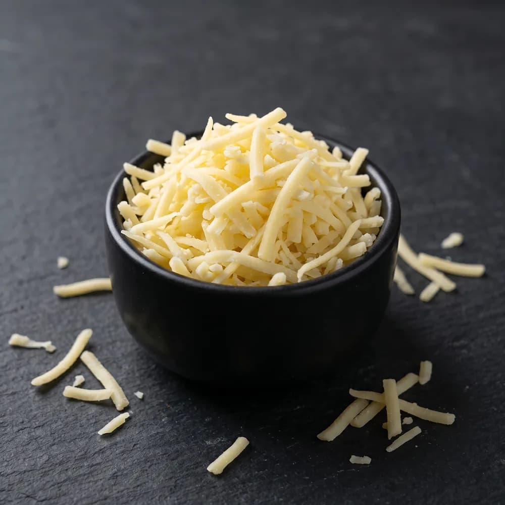 A bowl of shredded cheese