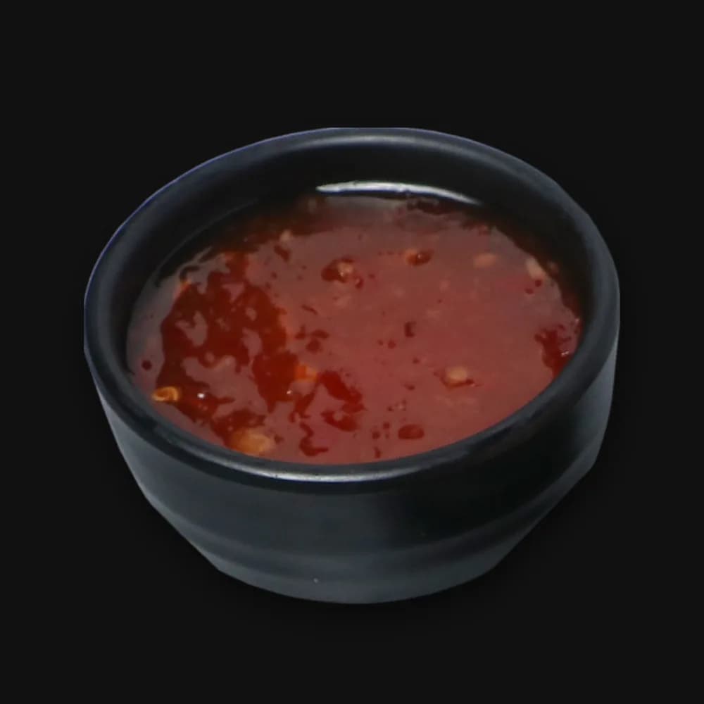 A bowl of Schezwan sauce (Extra Schezwan Sauce)