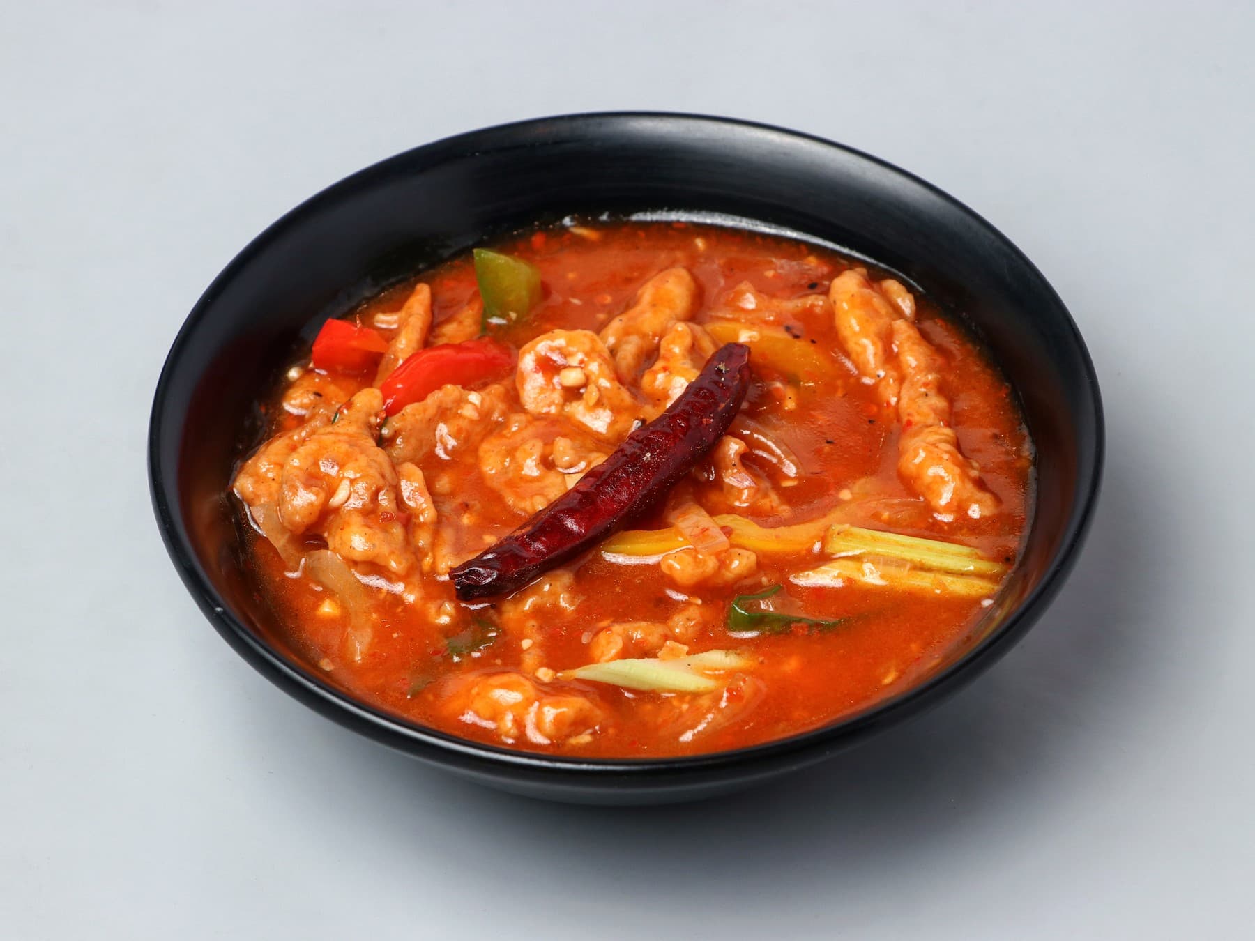 Chicken in a fiery red Hunan chilli sauce with dried chilli