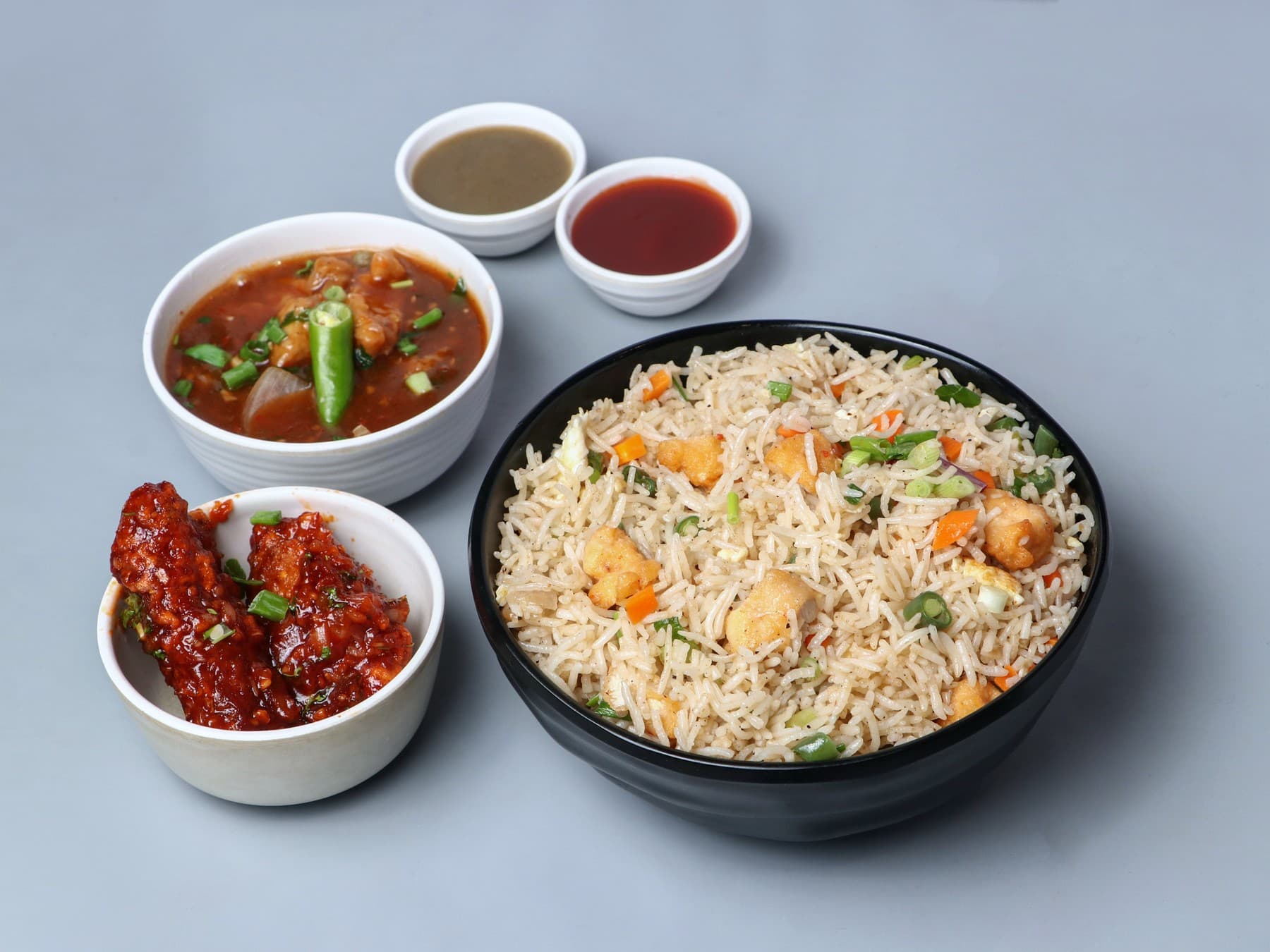 Chicken fried rice combo with chilli chicken, gravy and dips