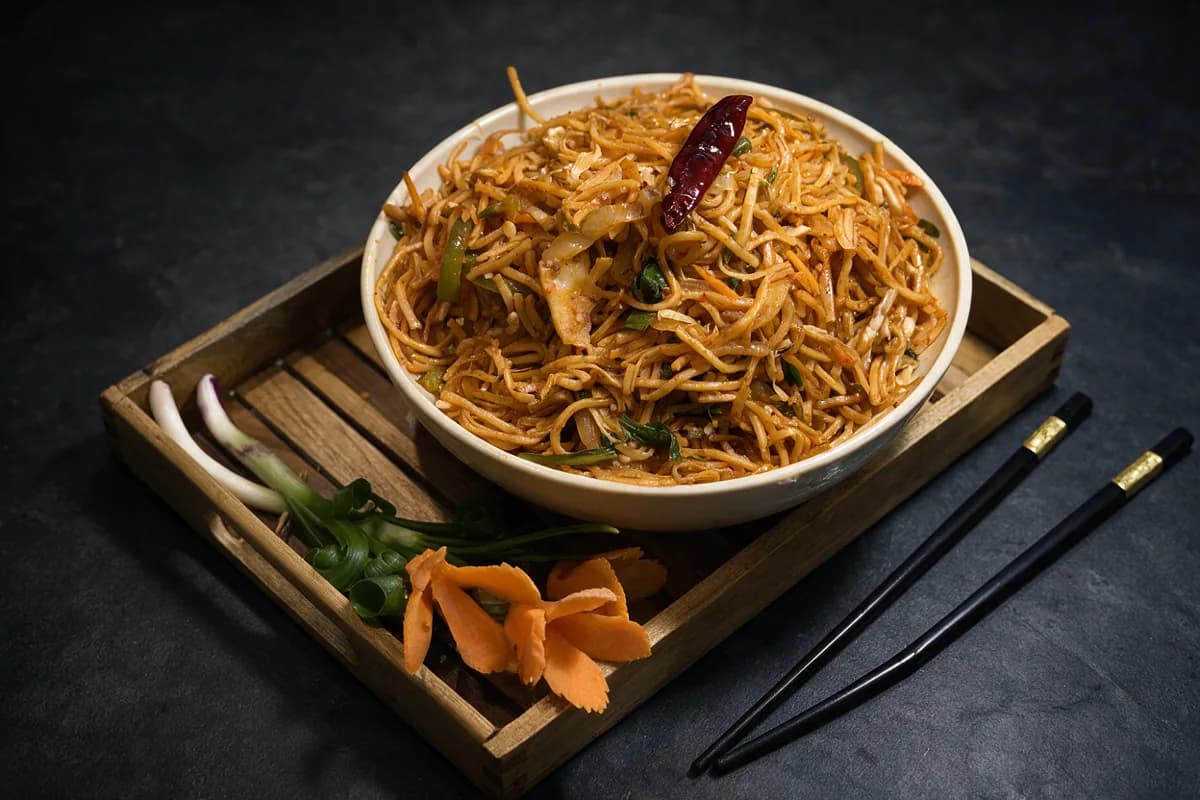 Dragon Toss Chicken Noodles, fiery red with dried chilli
